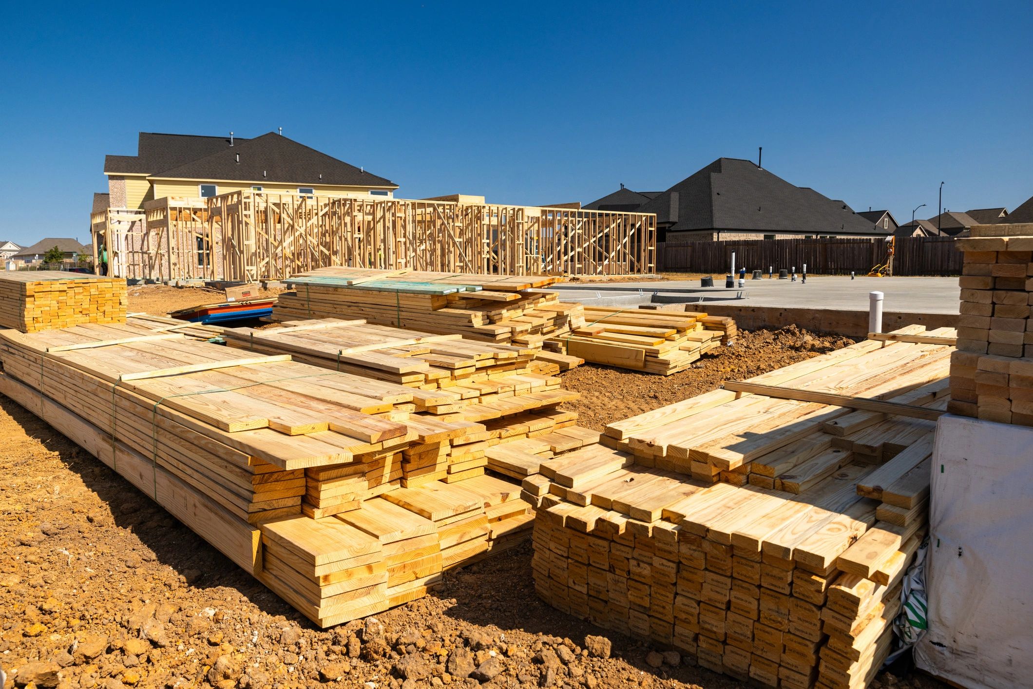 Construction framing and foundation work in progress